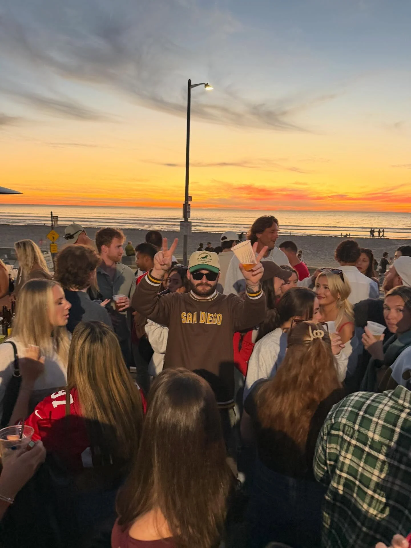 Patrick at an outdoor event at sunset